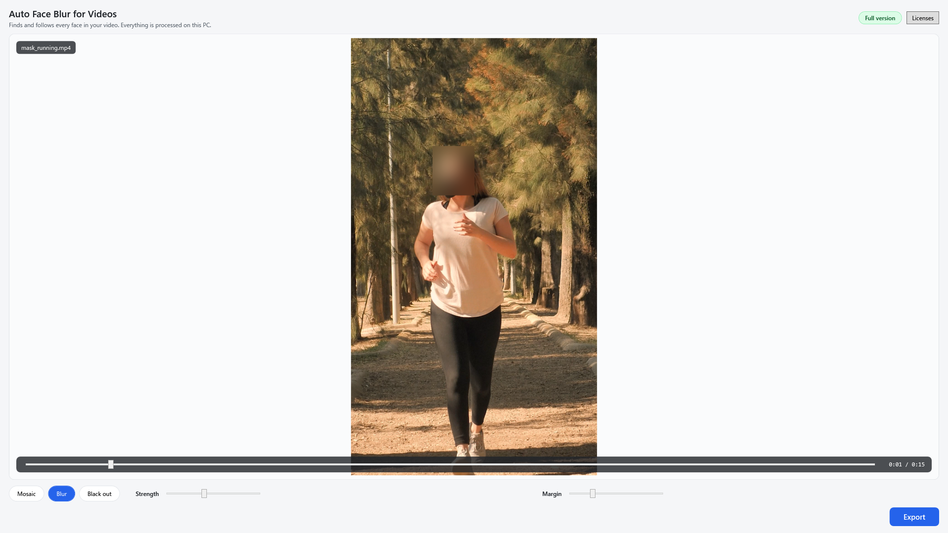 A vertical phone video of a person running toward the camera, face blurred