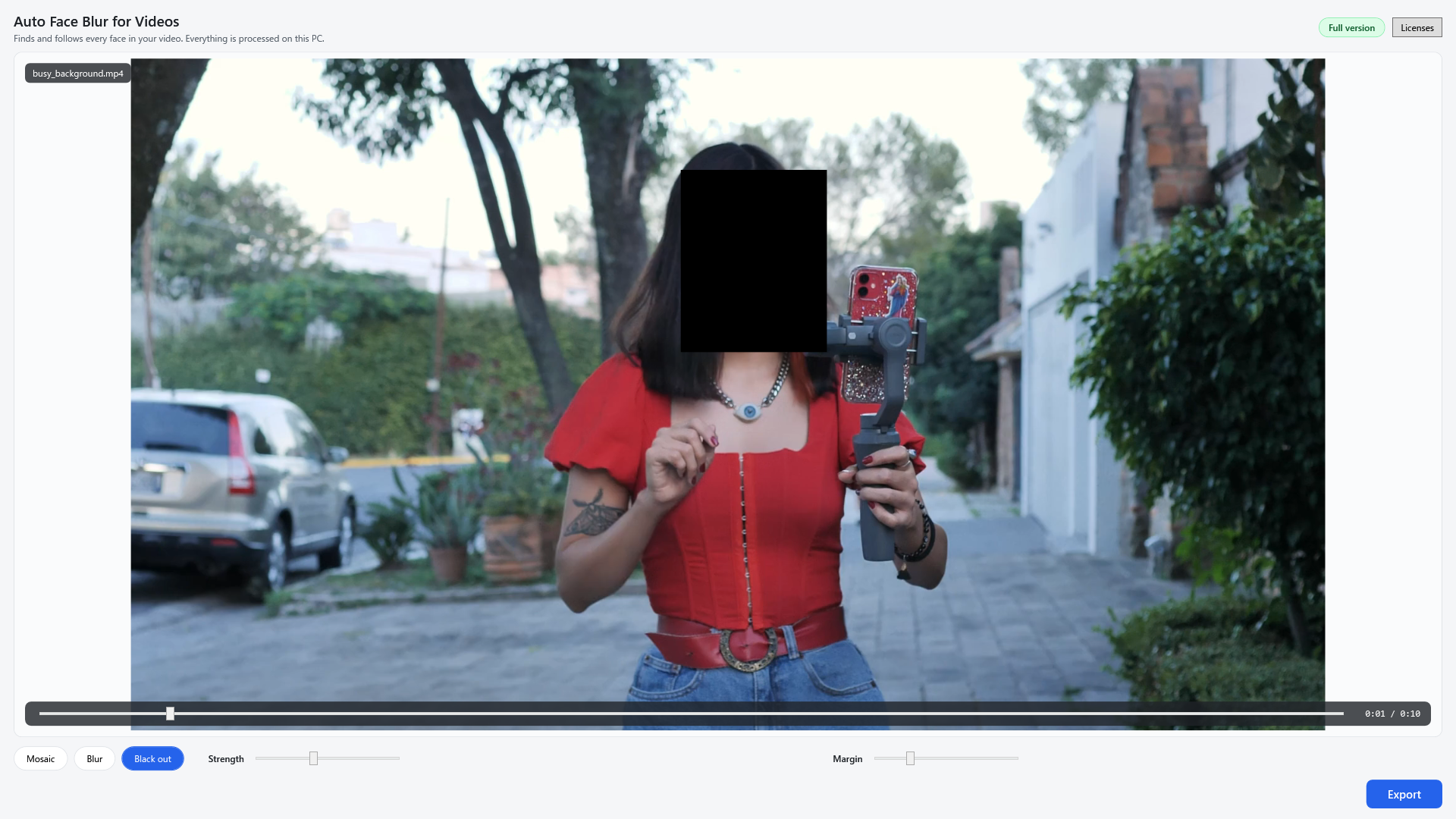 Street footage with a person's face blacked out